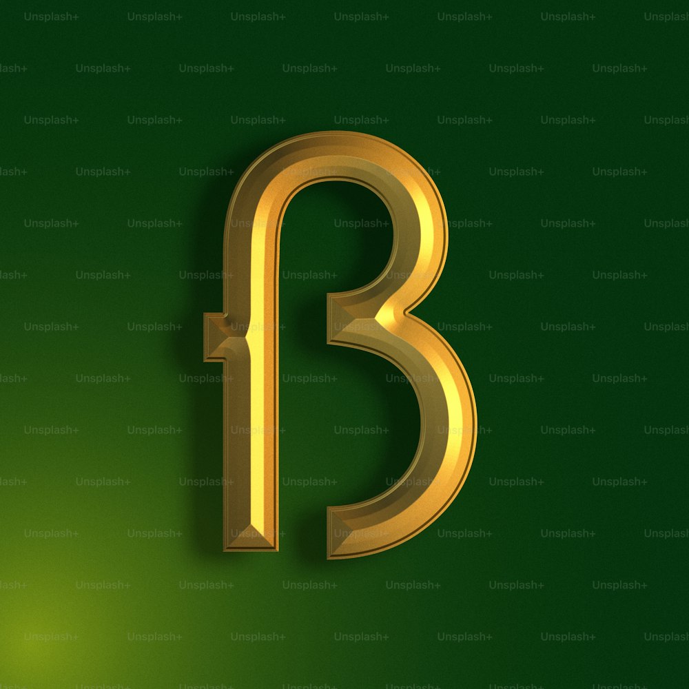 a golden letter that is on a green background