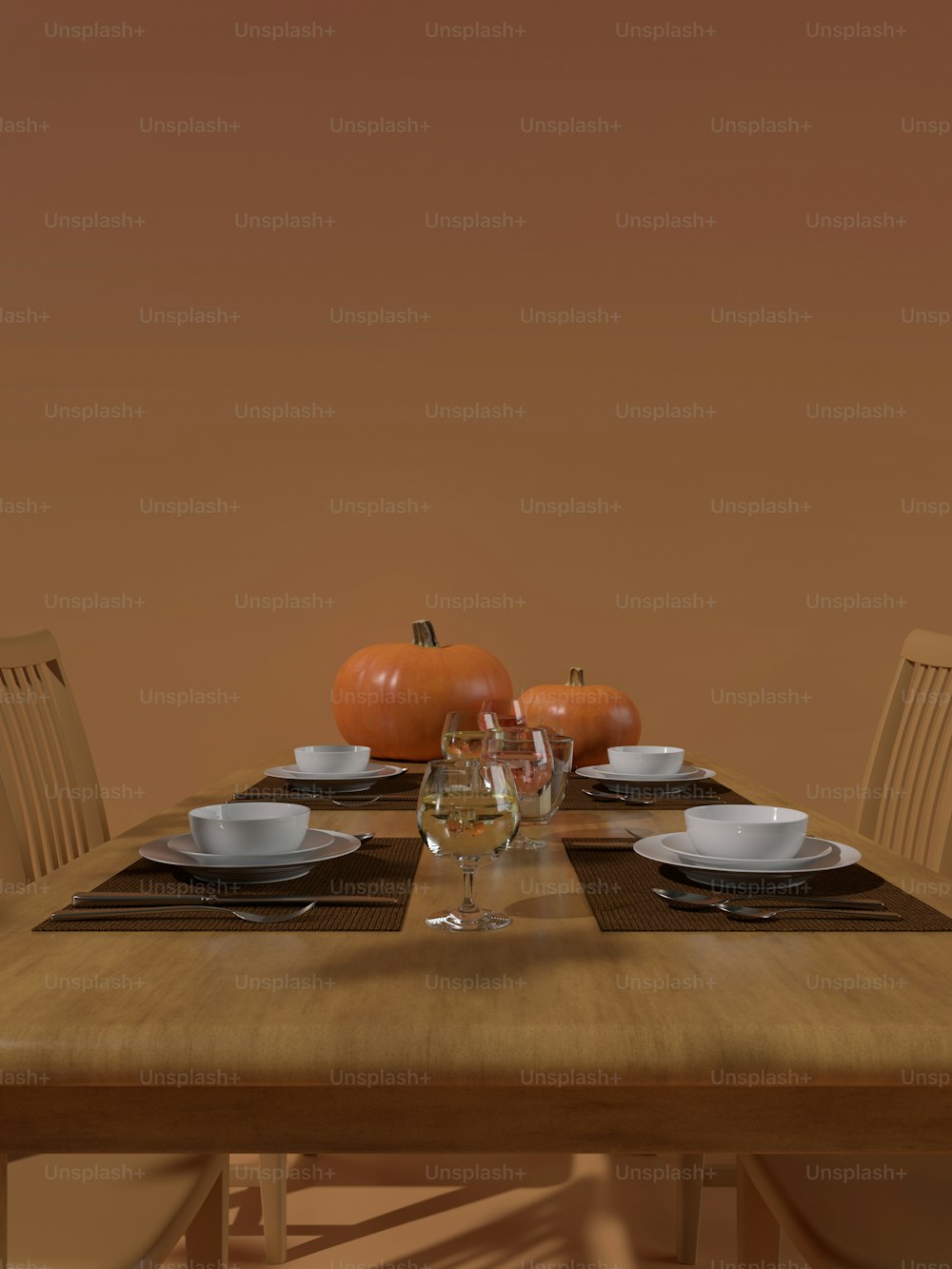 un tavolo di legno sormontato da piatti e bicchieri bianchi