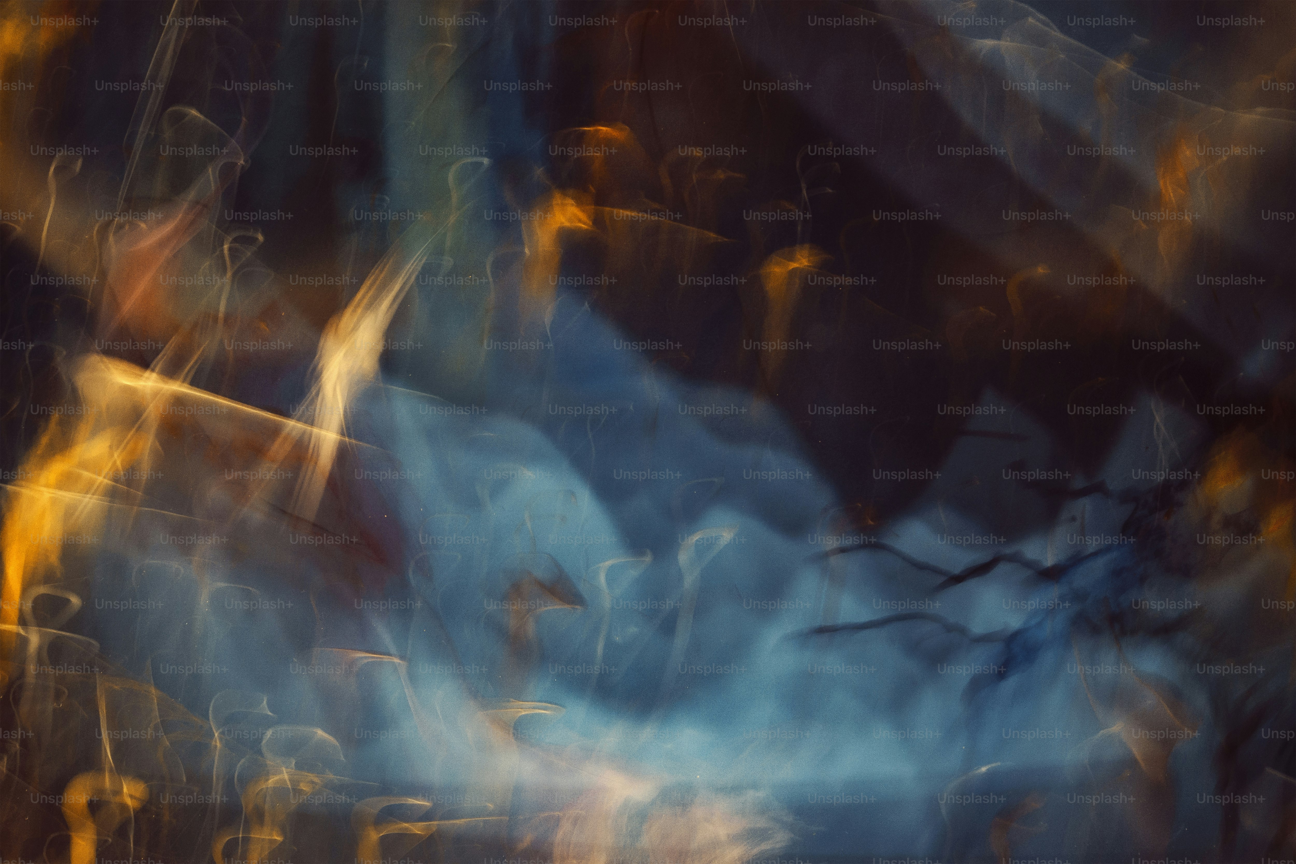 an abstract painting of blue and yellow colors