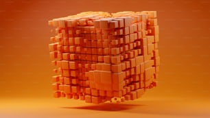 ein Stapel übereinander sitzender Orangenwürfel
