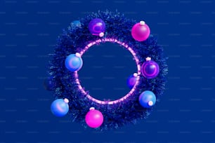 a blue christmas wreath with pink and blue ornaments