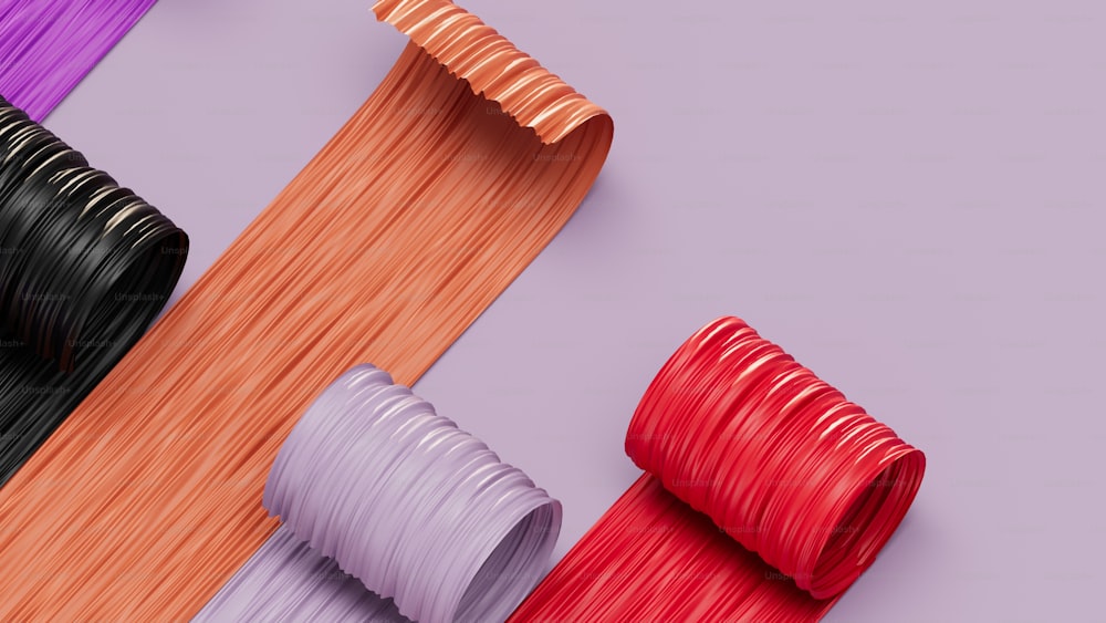 a group of different colors of hair on a purple background