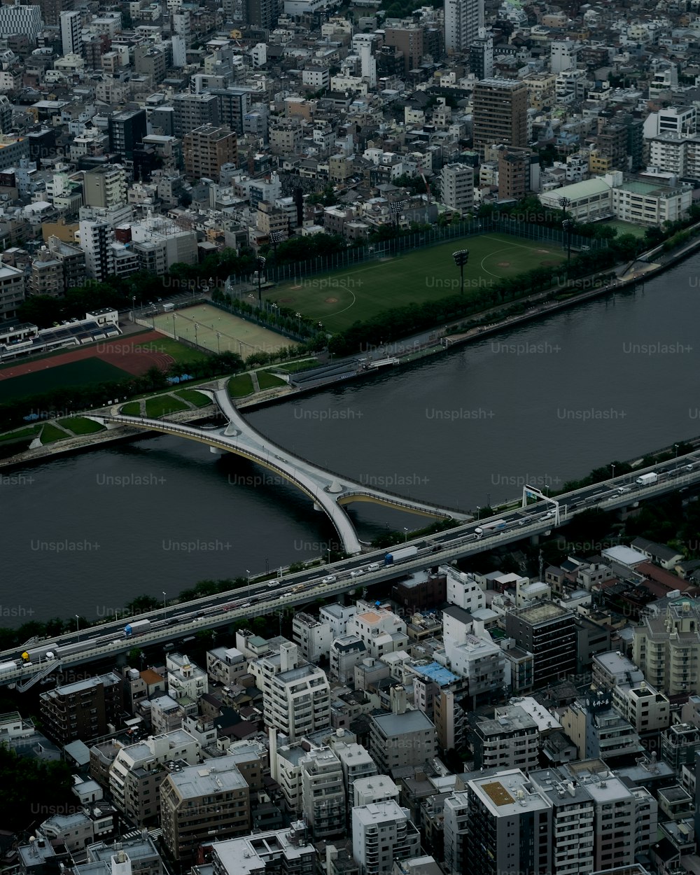 an aerial view of a city and a river