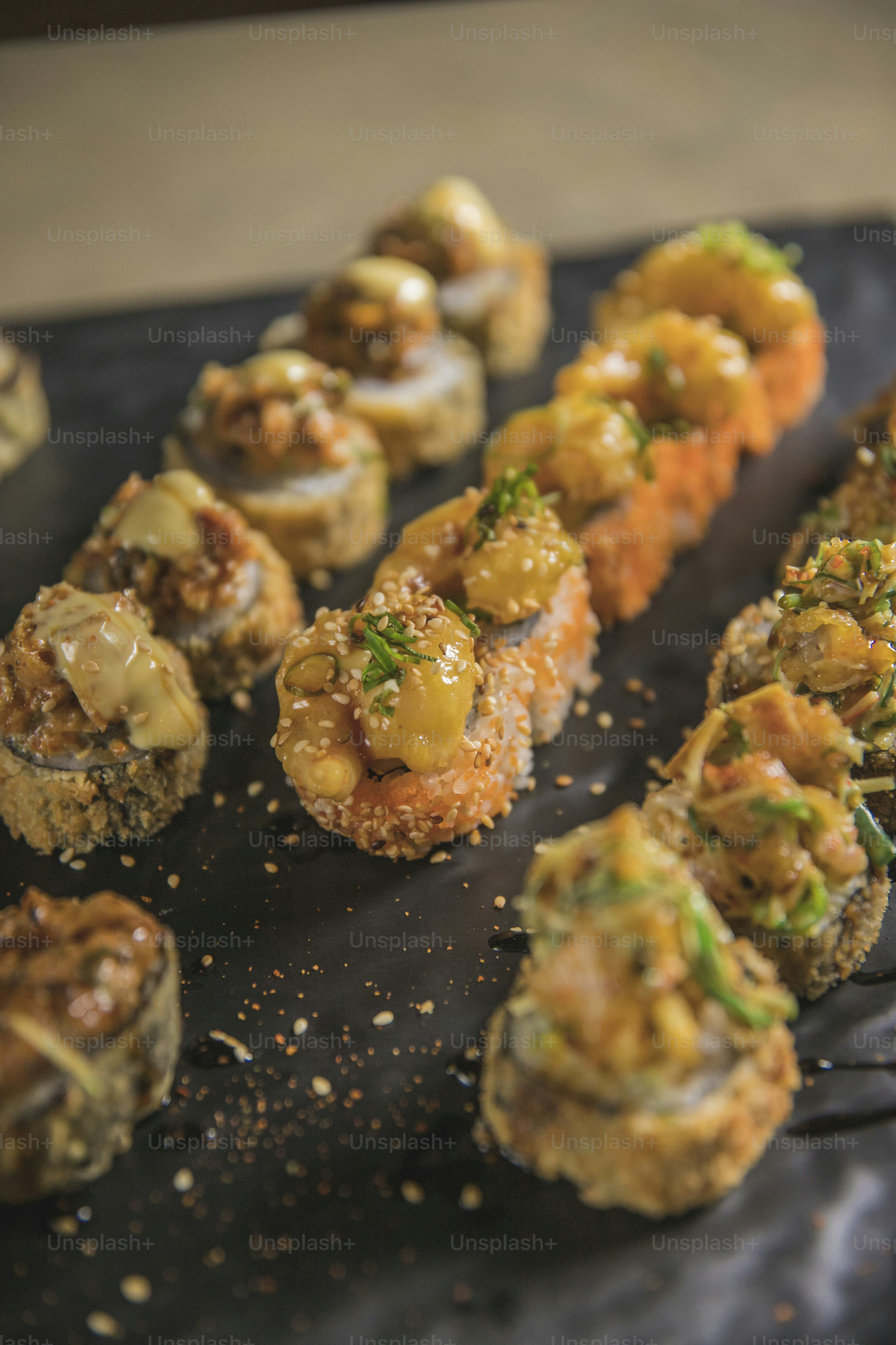 a black tray topped with different types of food