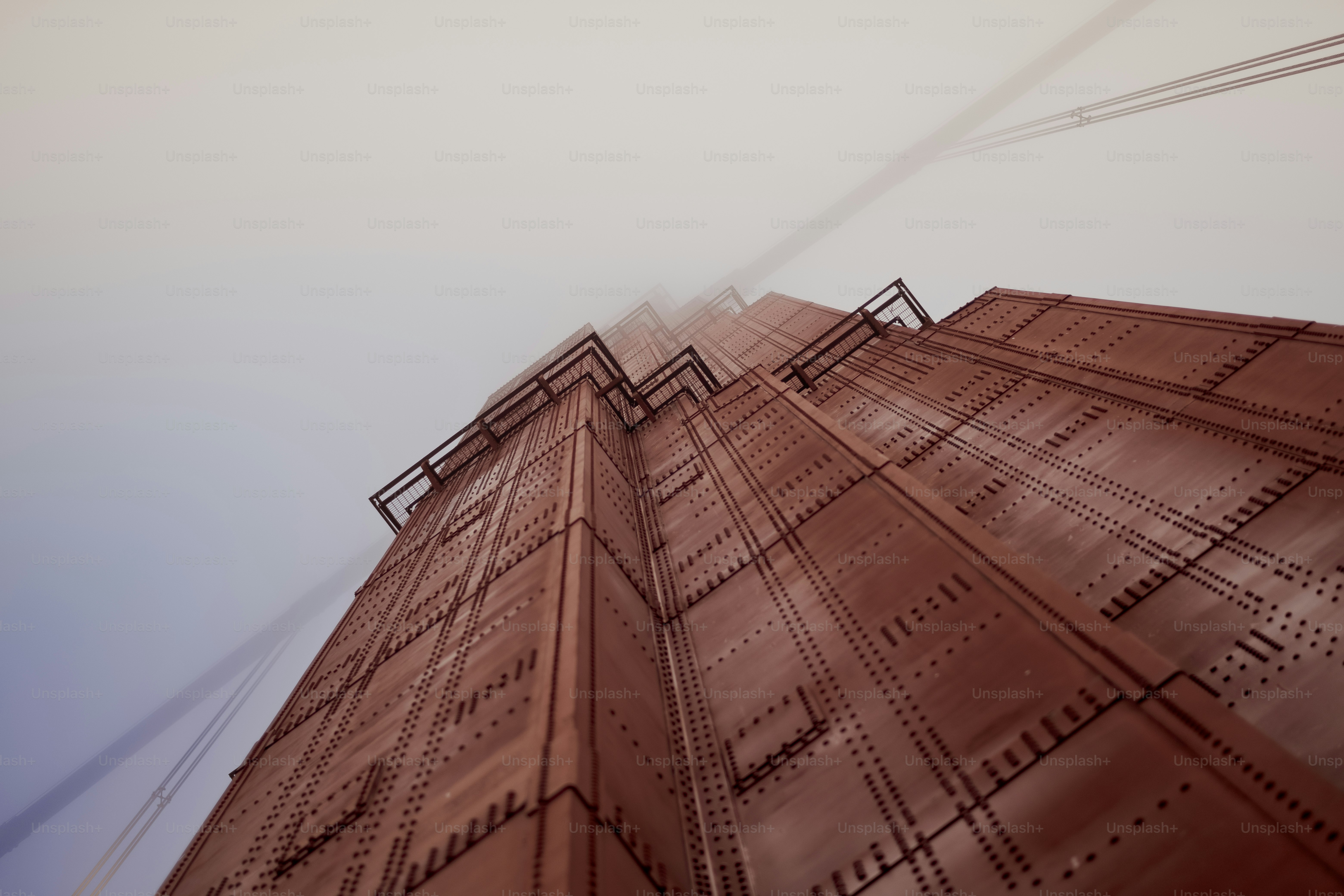 a very tall building with a sky in the background