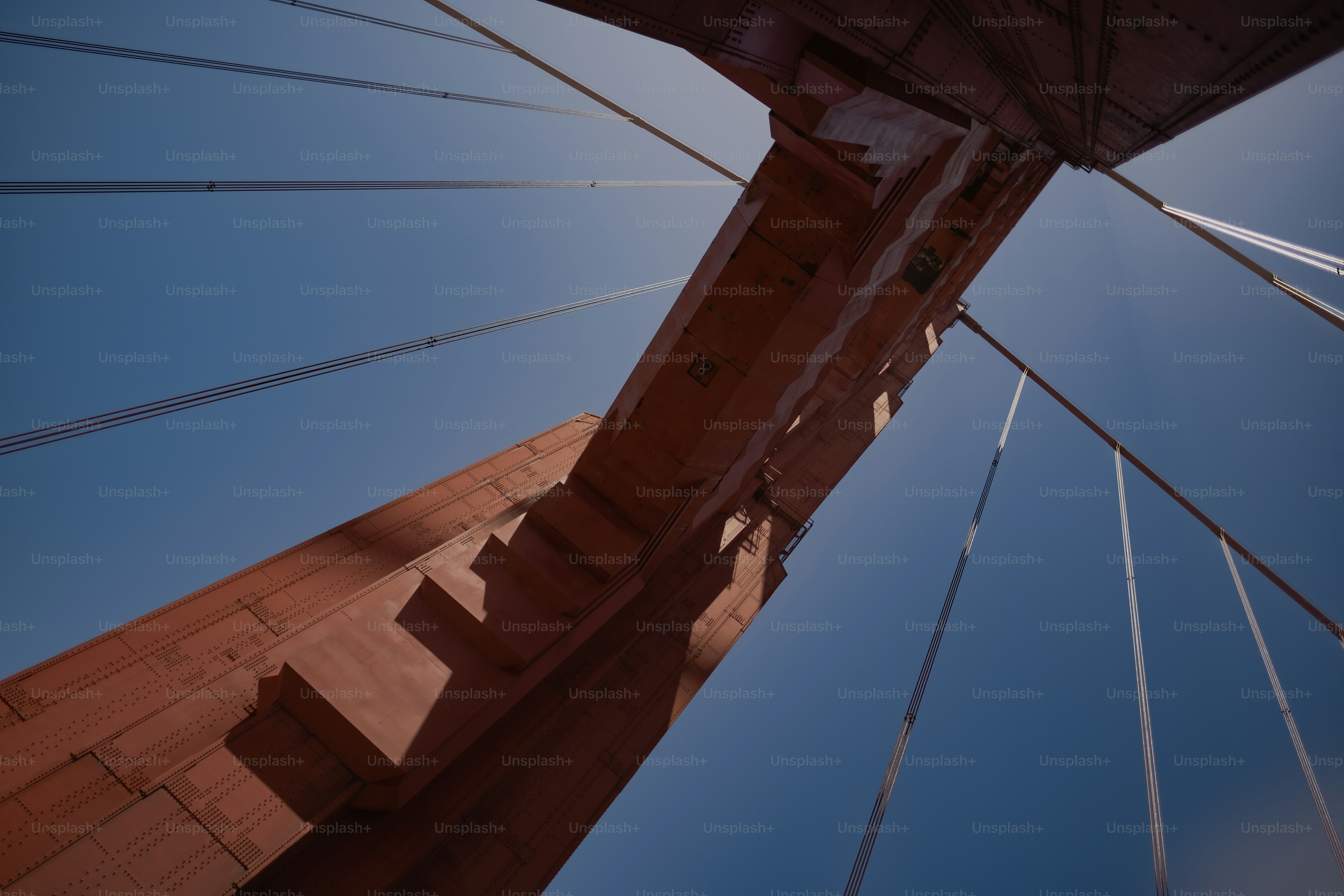 A view of the top of a bridge from below photo – Architecture Image on ...