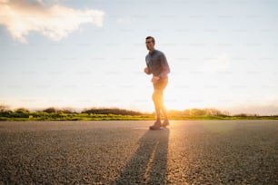 a man standing in the middle of the road