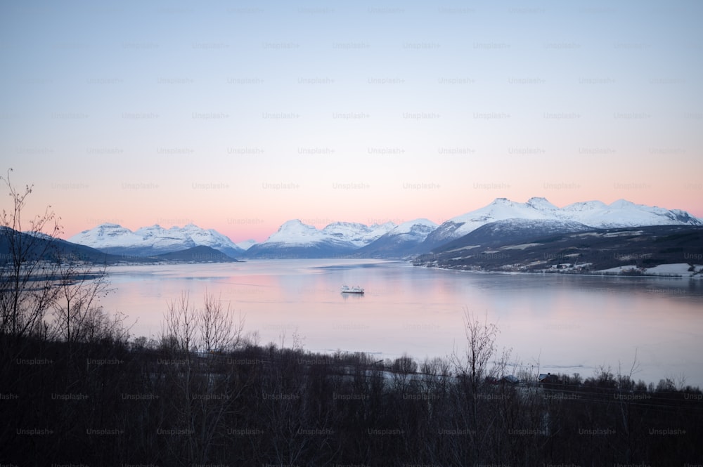 a large body of water surrounded by mountains