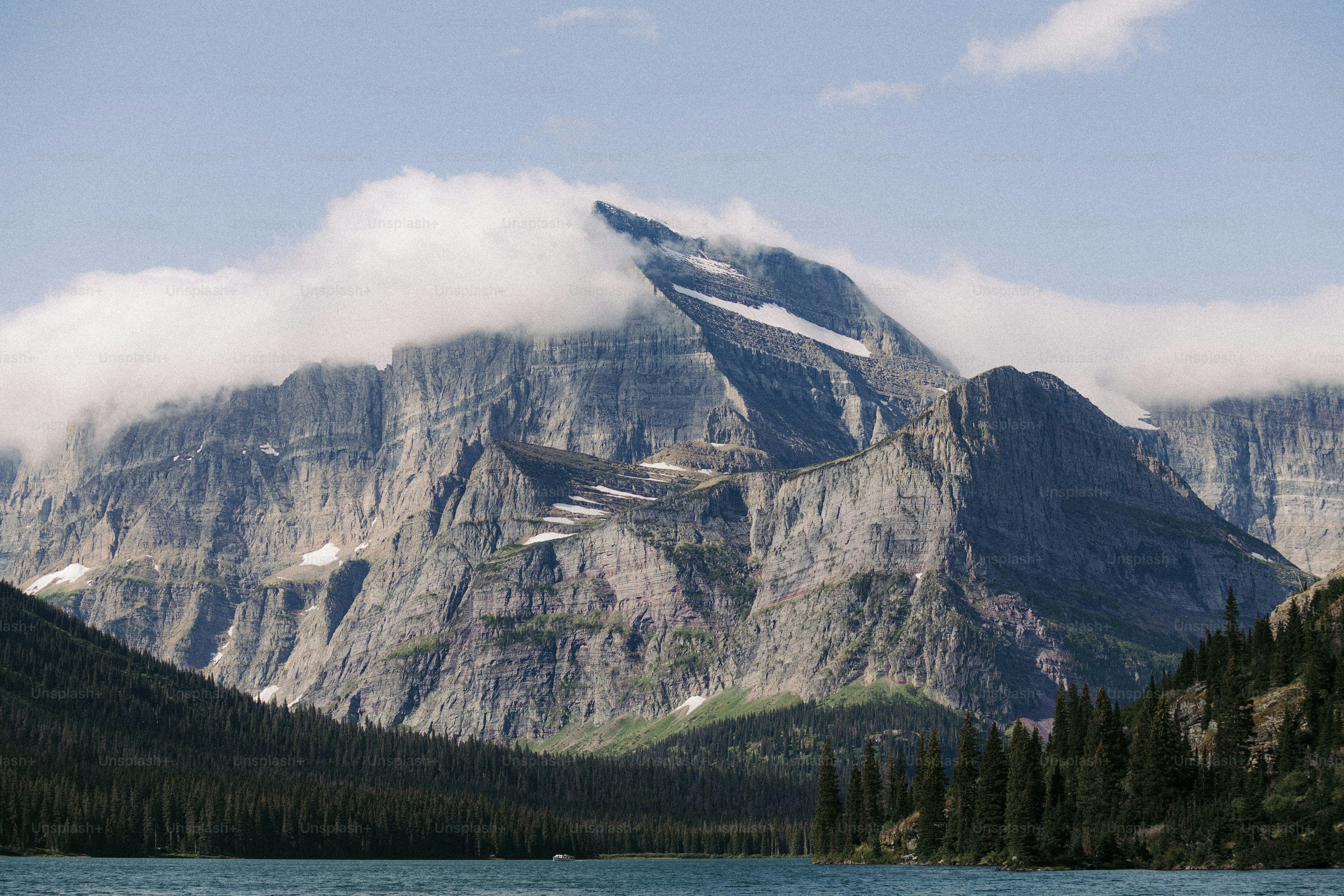 a mountain with a lake in front of it
