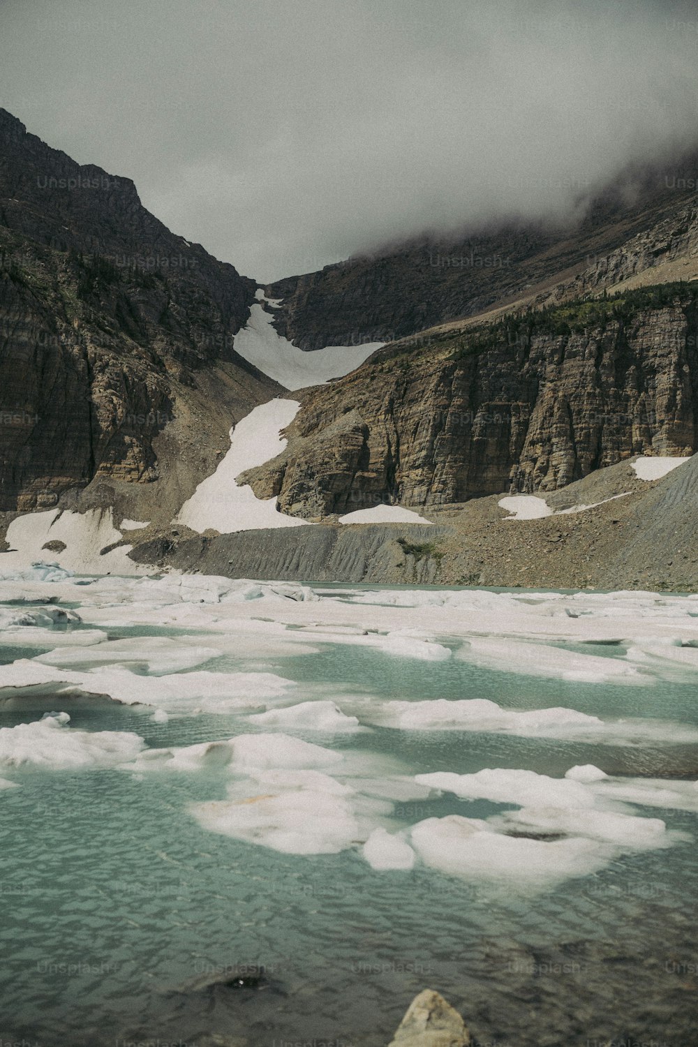 a large body of water surrounded by mountains