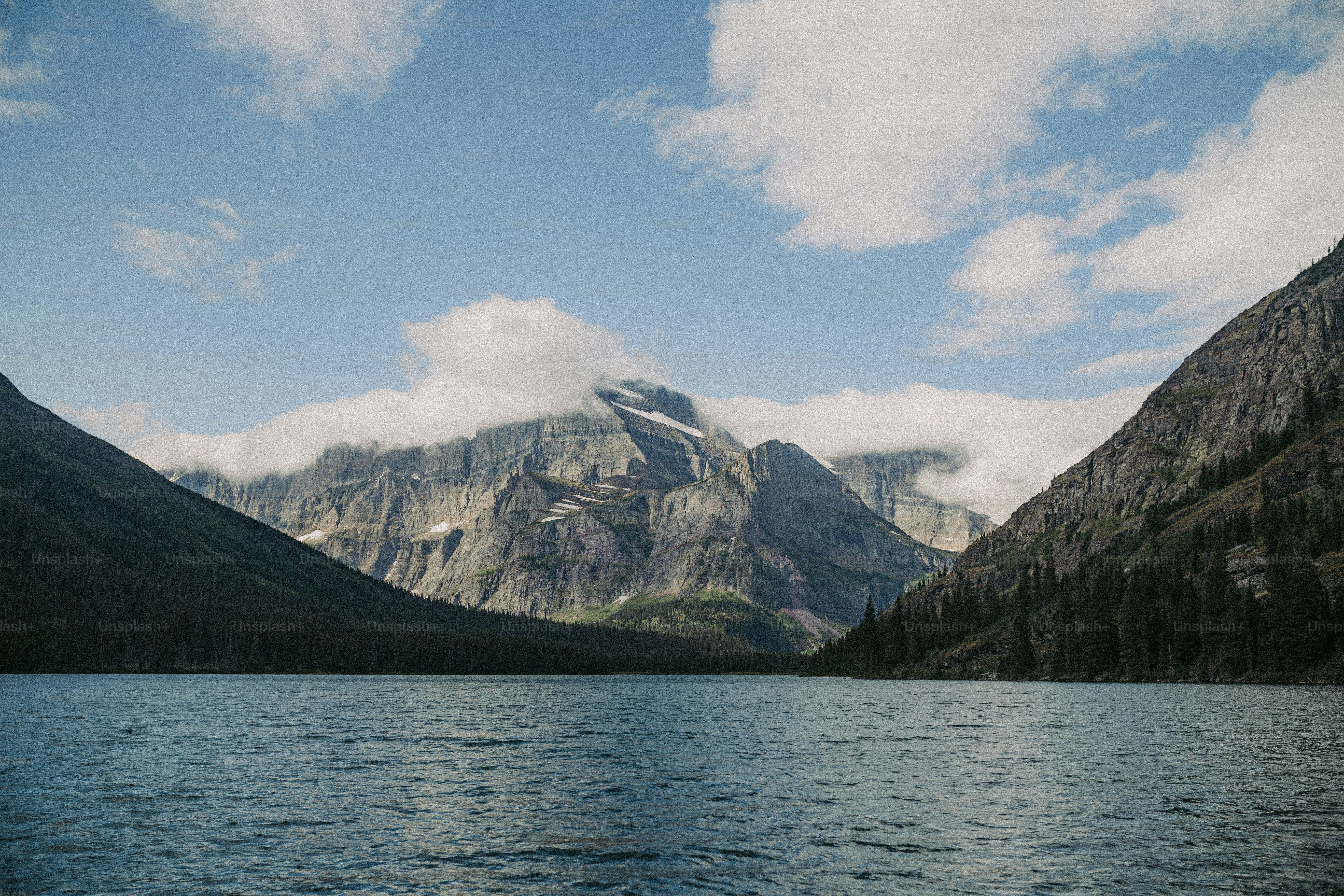 a large body of water surrounded by mountains