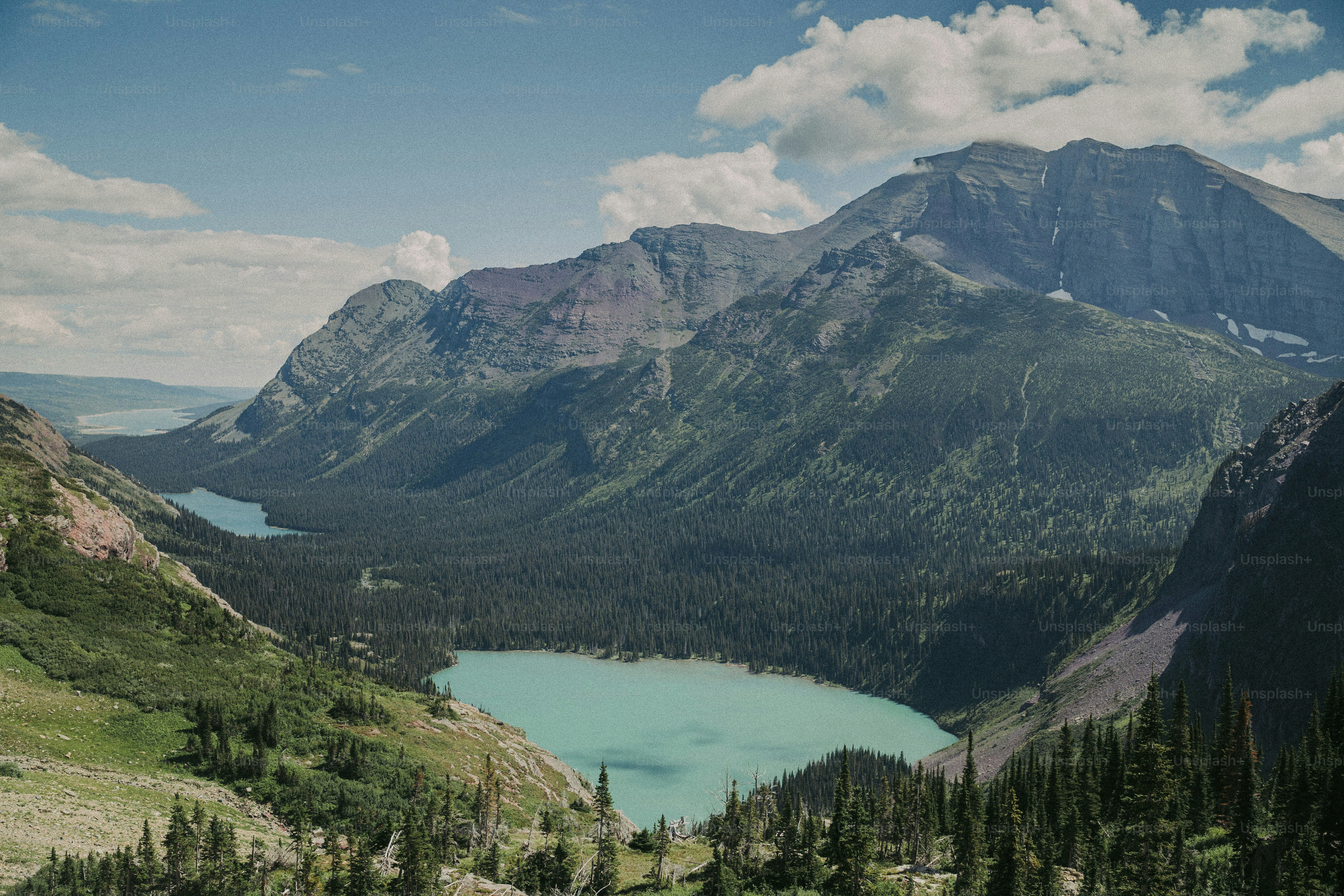 a mountain range with a lake in the middle of it