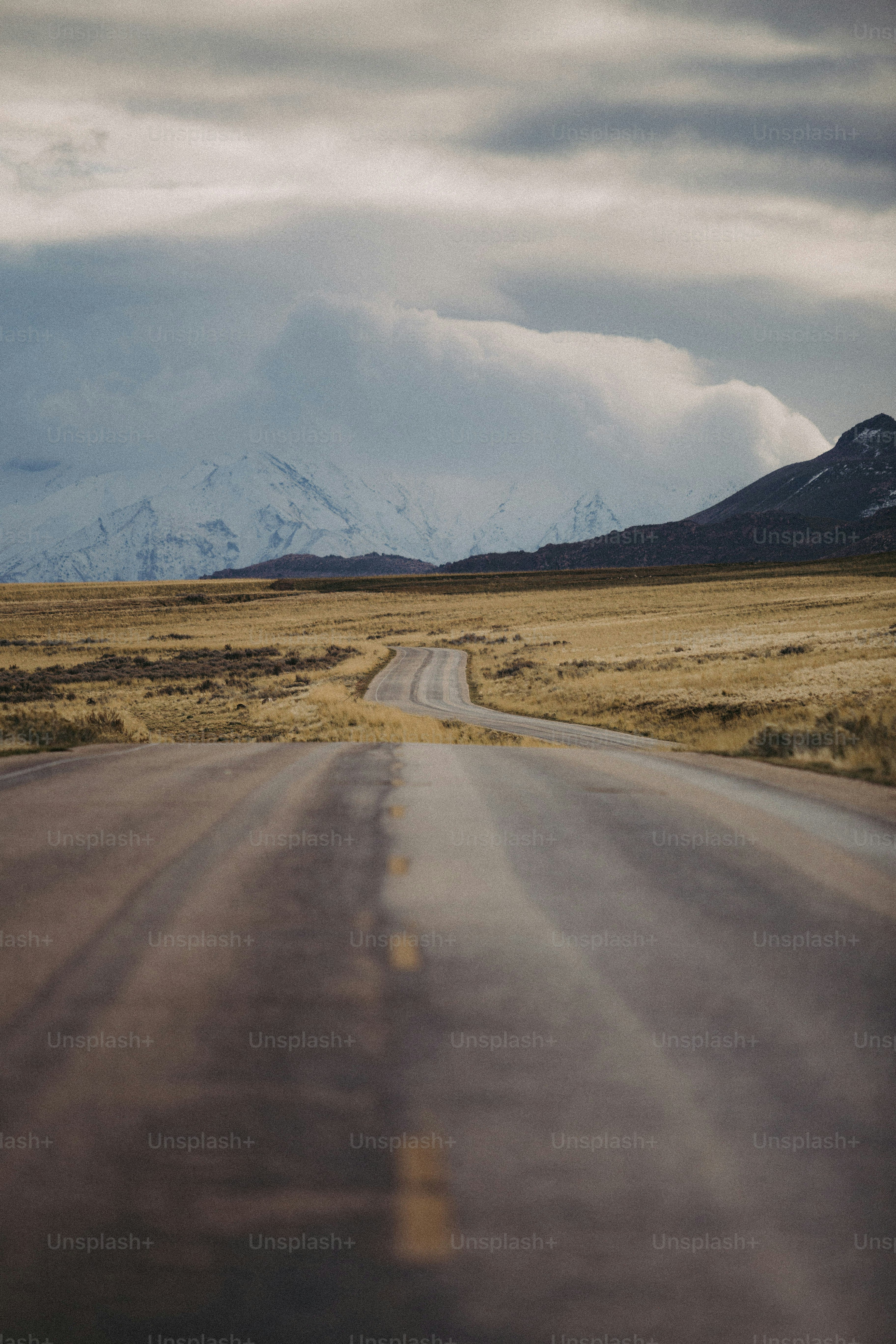 an empty road in the middle of nowhere