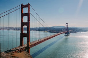 a view of the golden gate bridge from the top of a hill