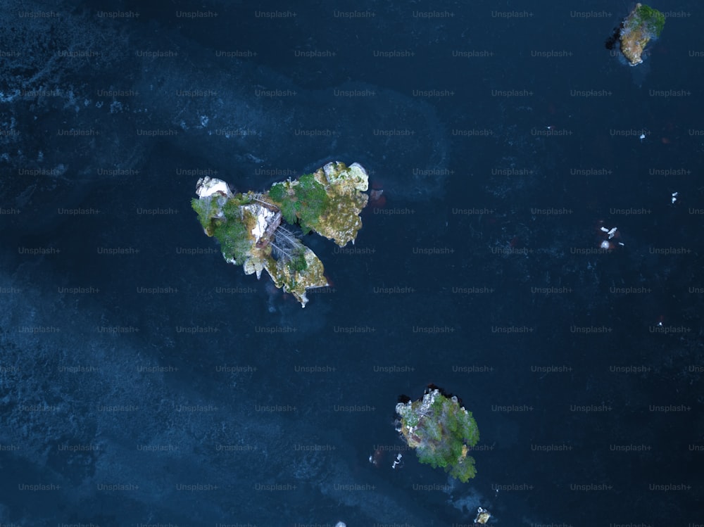 an aerial view of a group of islands in the water