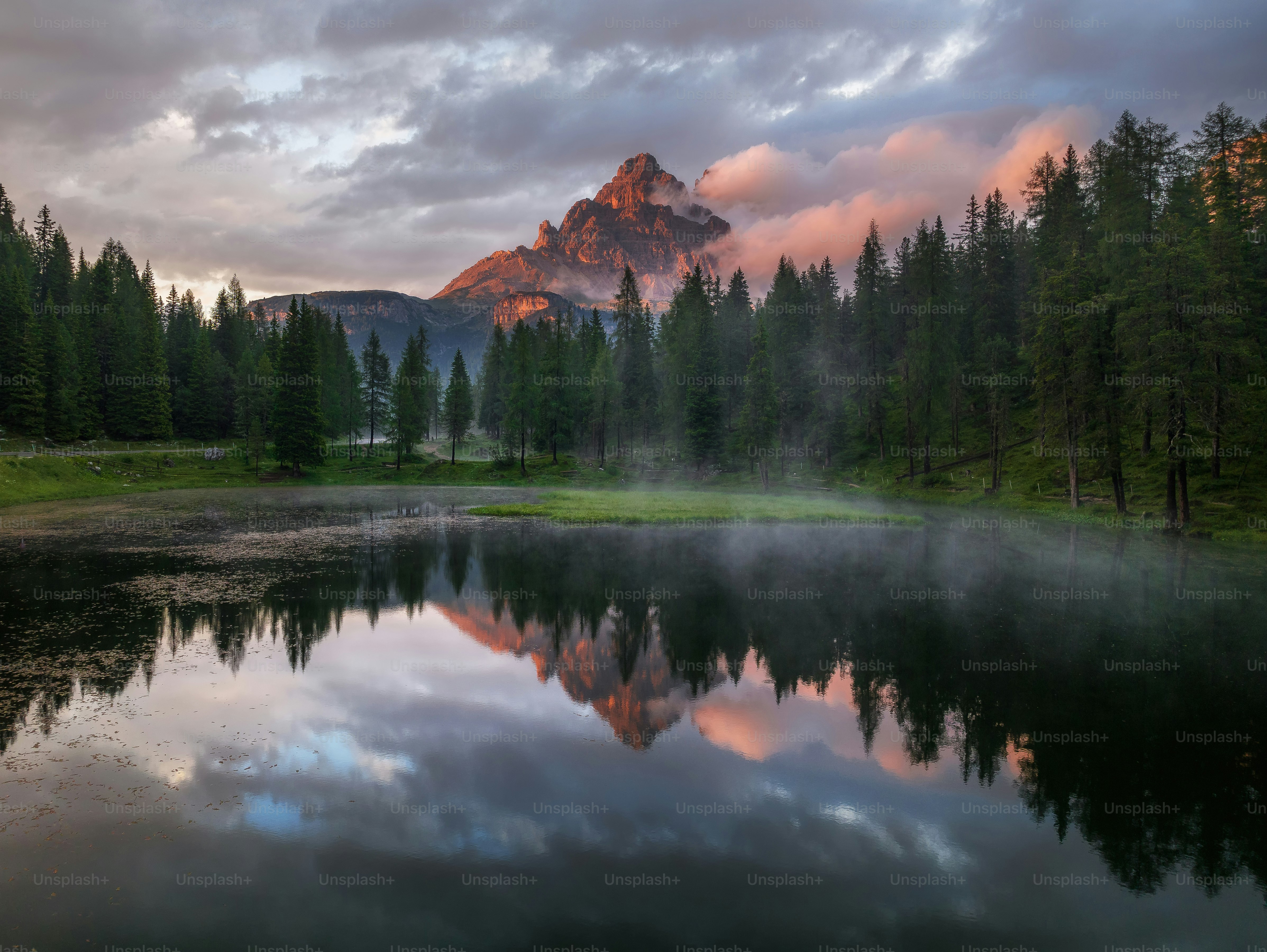 a lake with a mountain in the background
