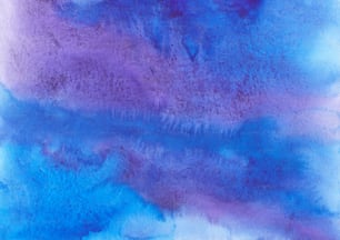 a painting of blue and purple colors on a white background