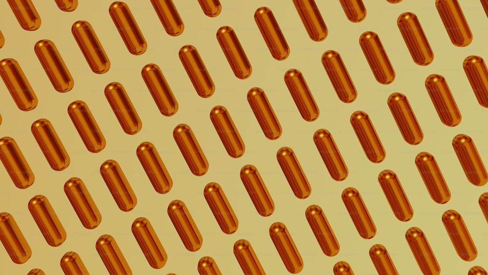 a yellow background with rows of orange pills