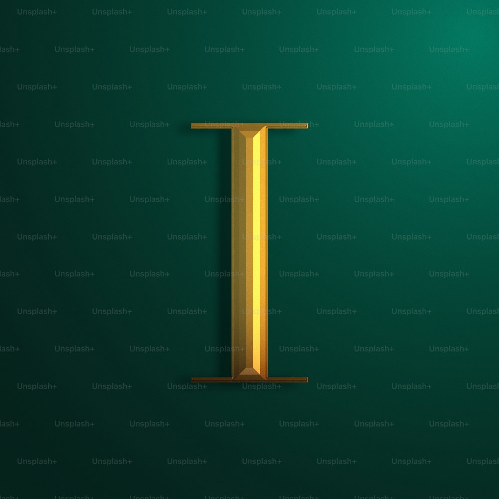 a gold letter i on a green background
