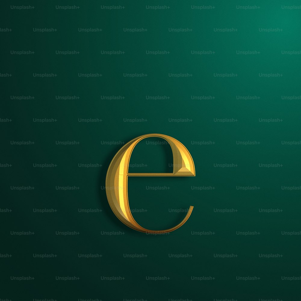 a gold letter e on a green background