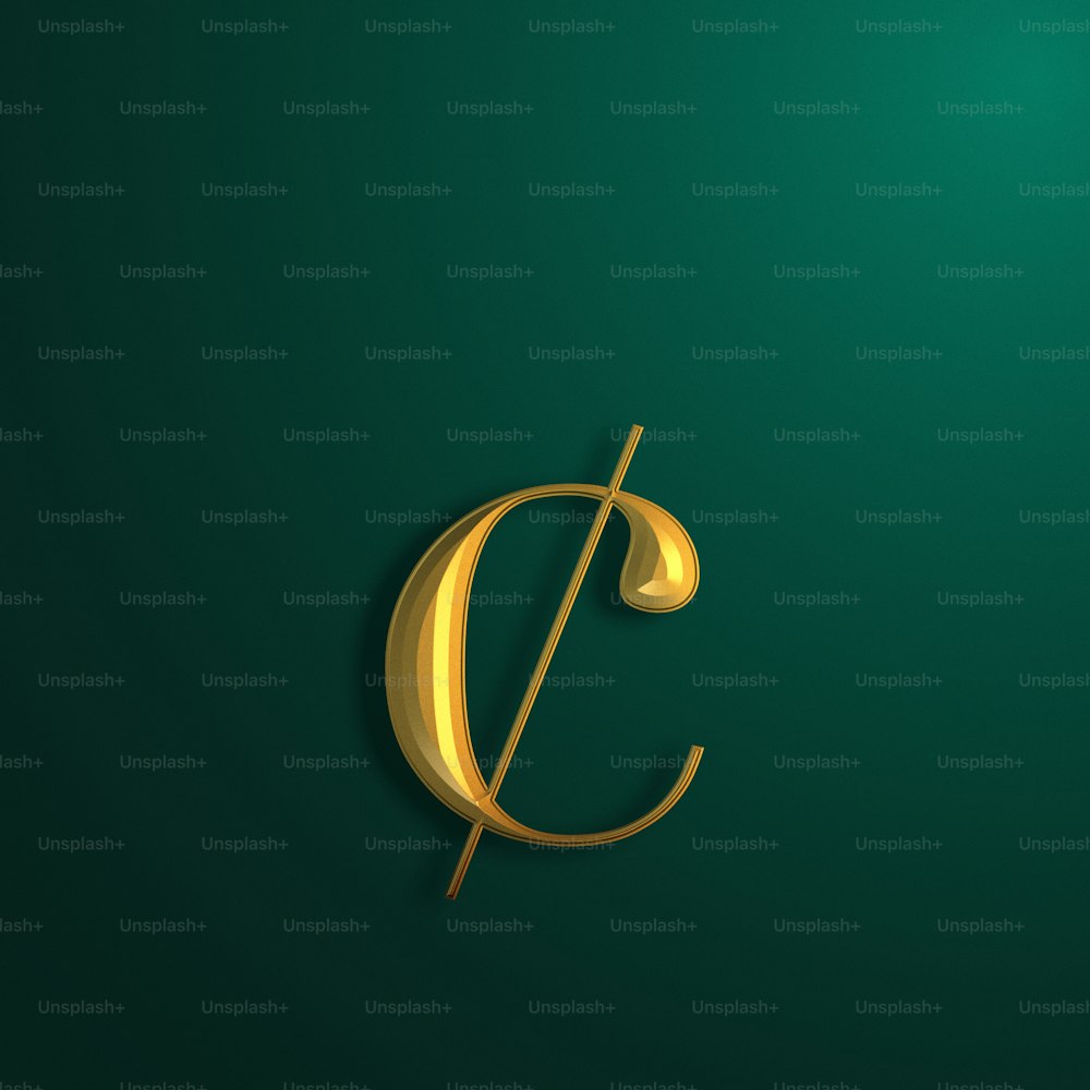 the letter c in gold on a green background