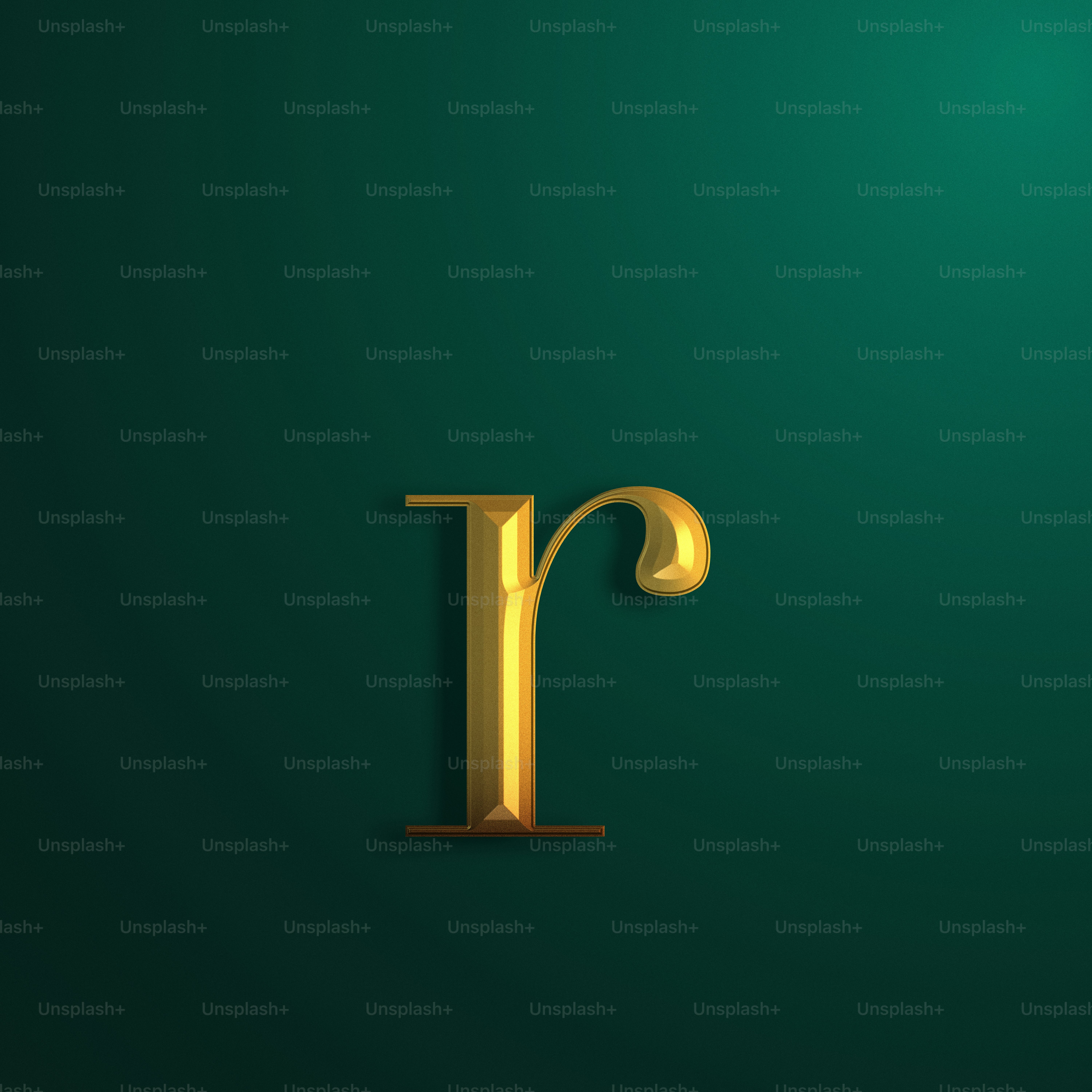 a gold letter on a green background