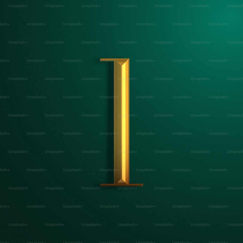 a gold letter i on a green background