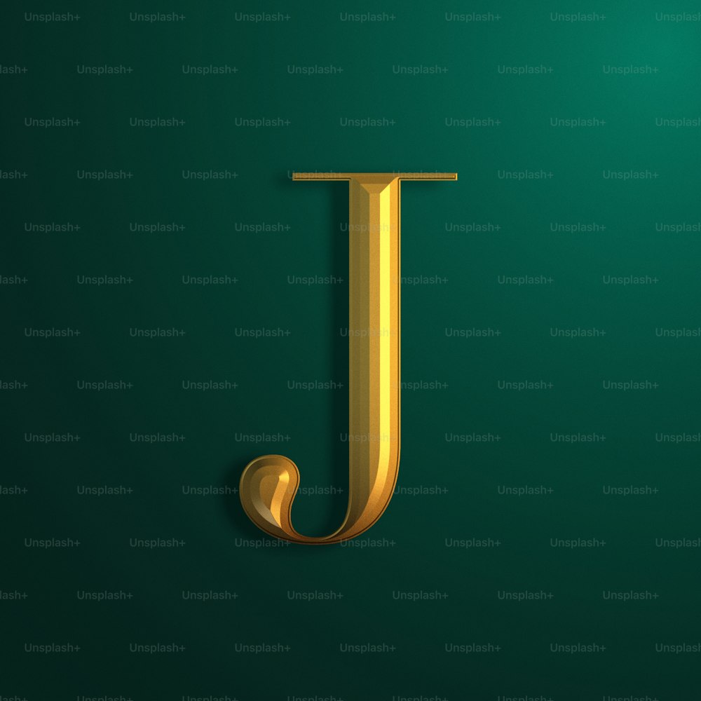 ein goldener Buchstabe J auf grünem Hintergrund