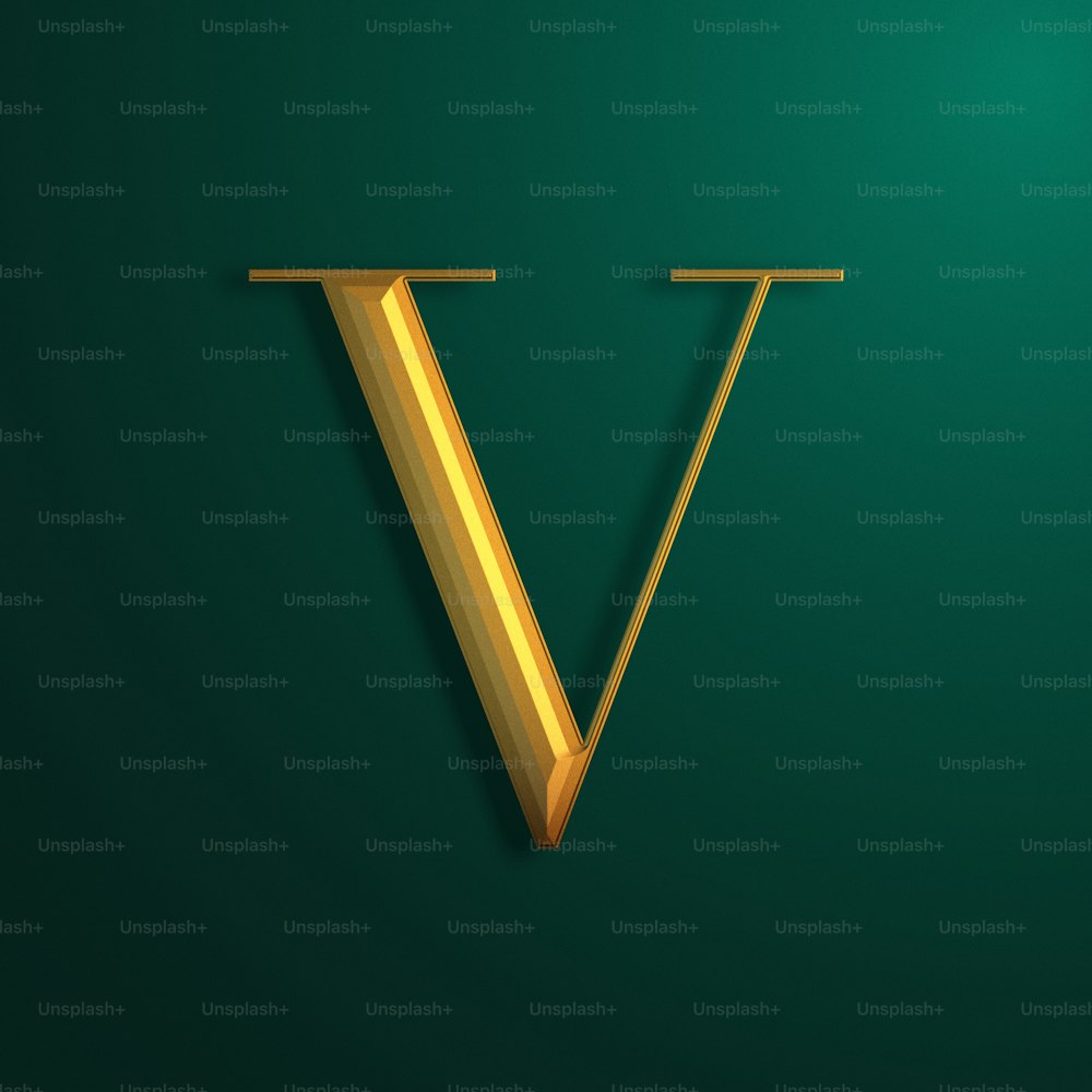 a gold letter v on a green background