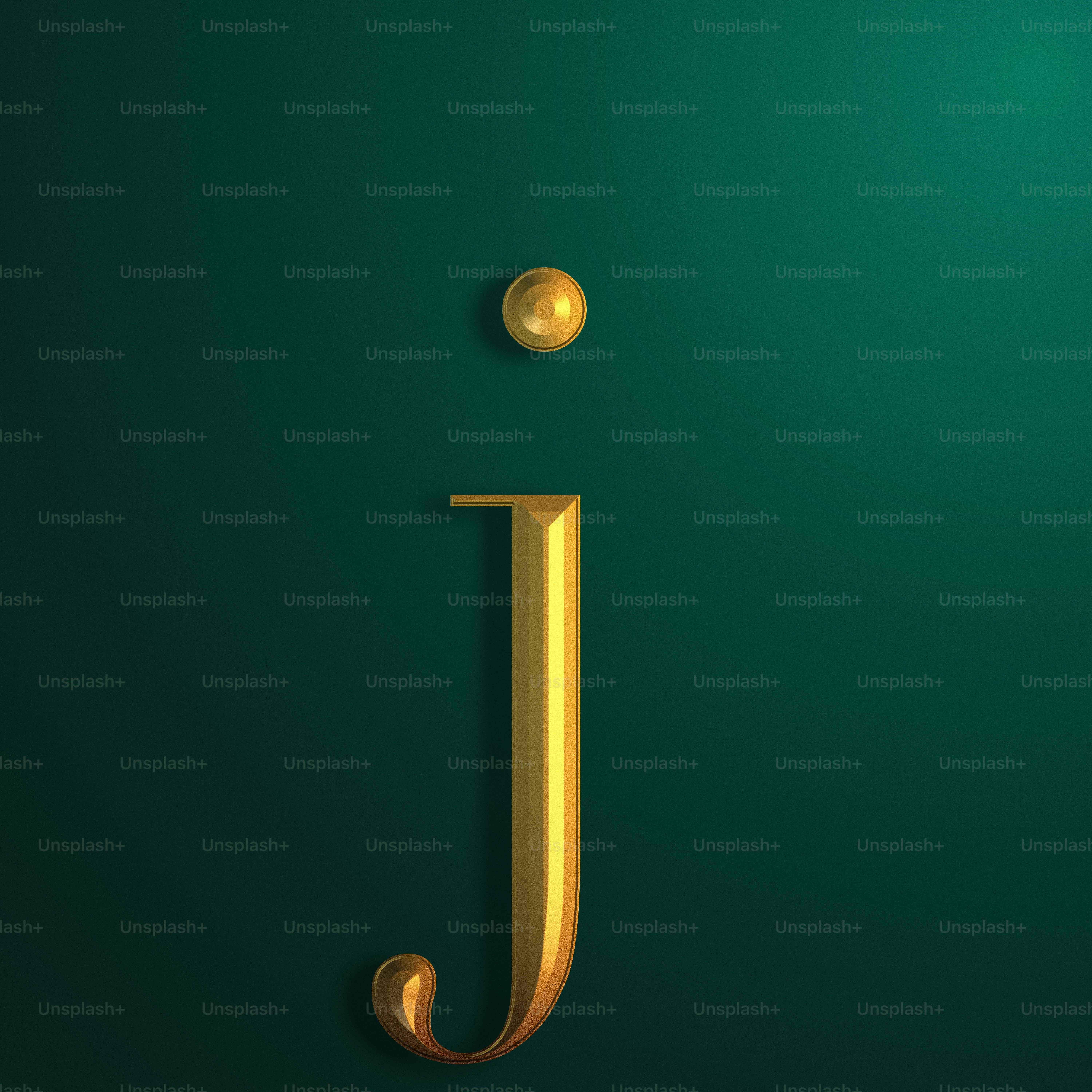a gold letter j on a green background