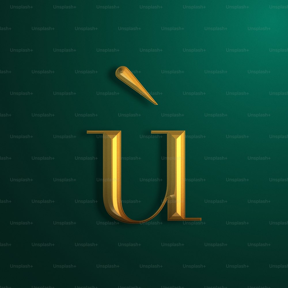La lettre U en or sur fond vert