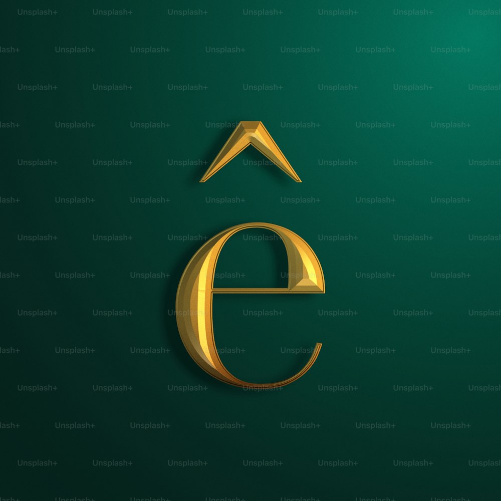 a gold letter e on a green background