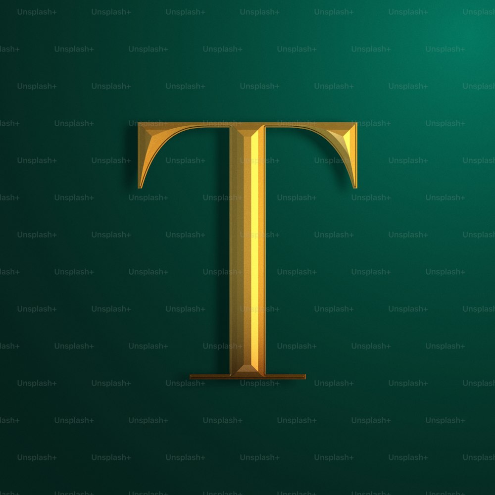 a gold letter t on a green background