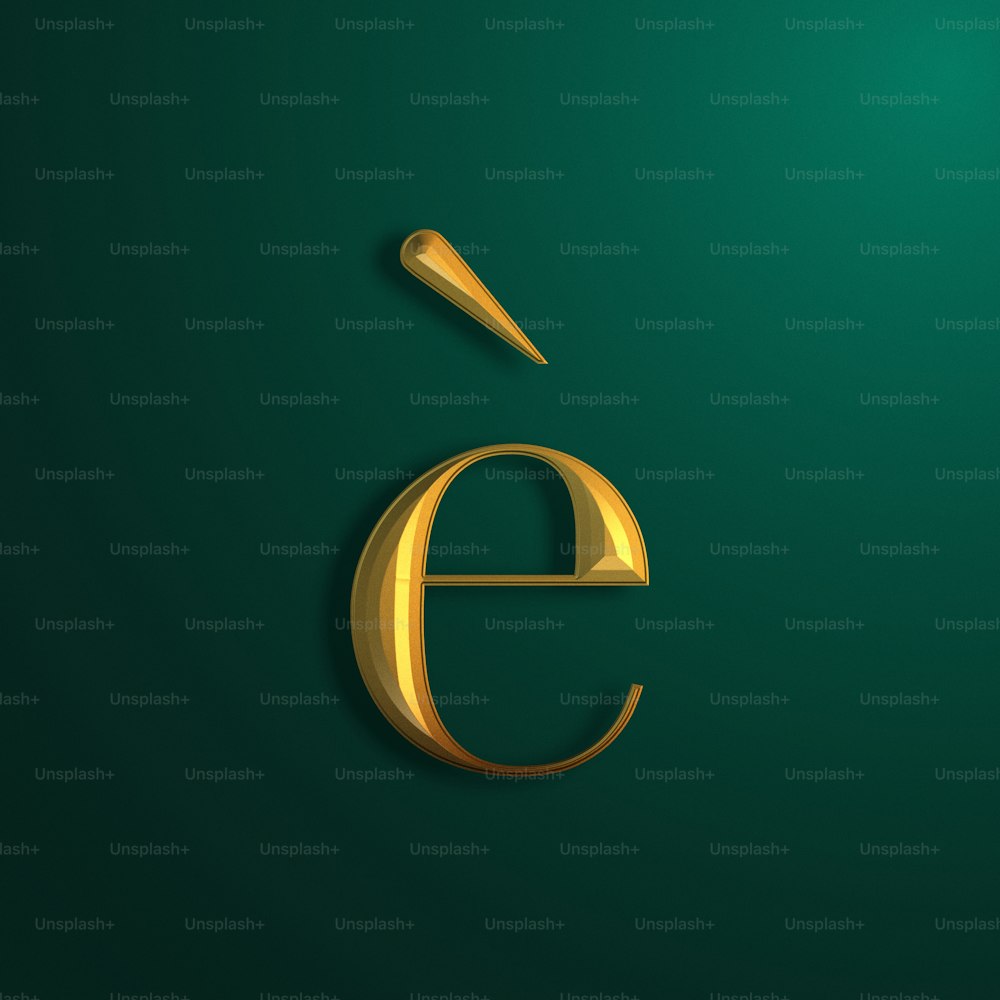 a gold letter e on a green background