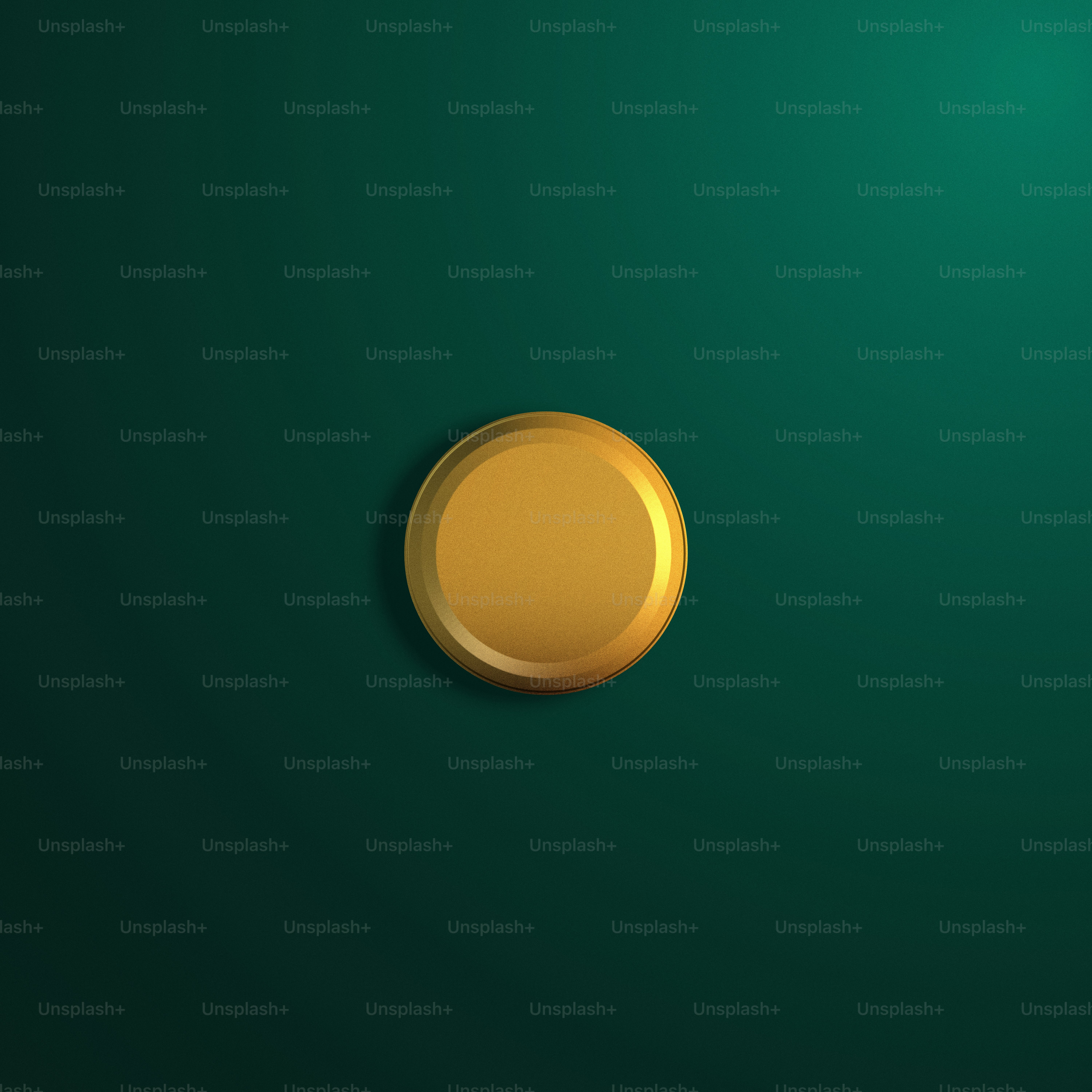 a gold button on a green background