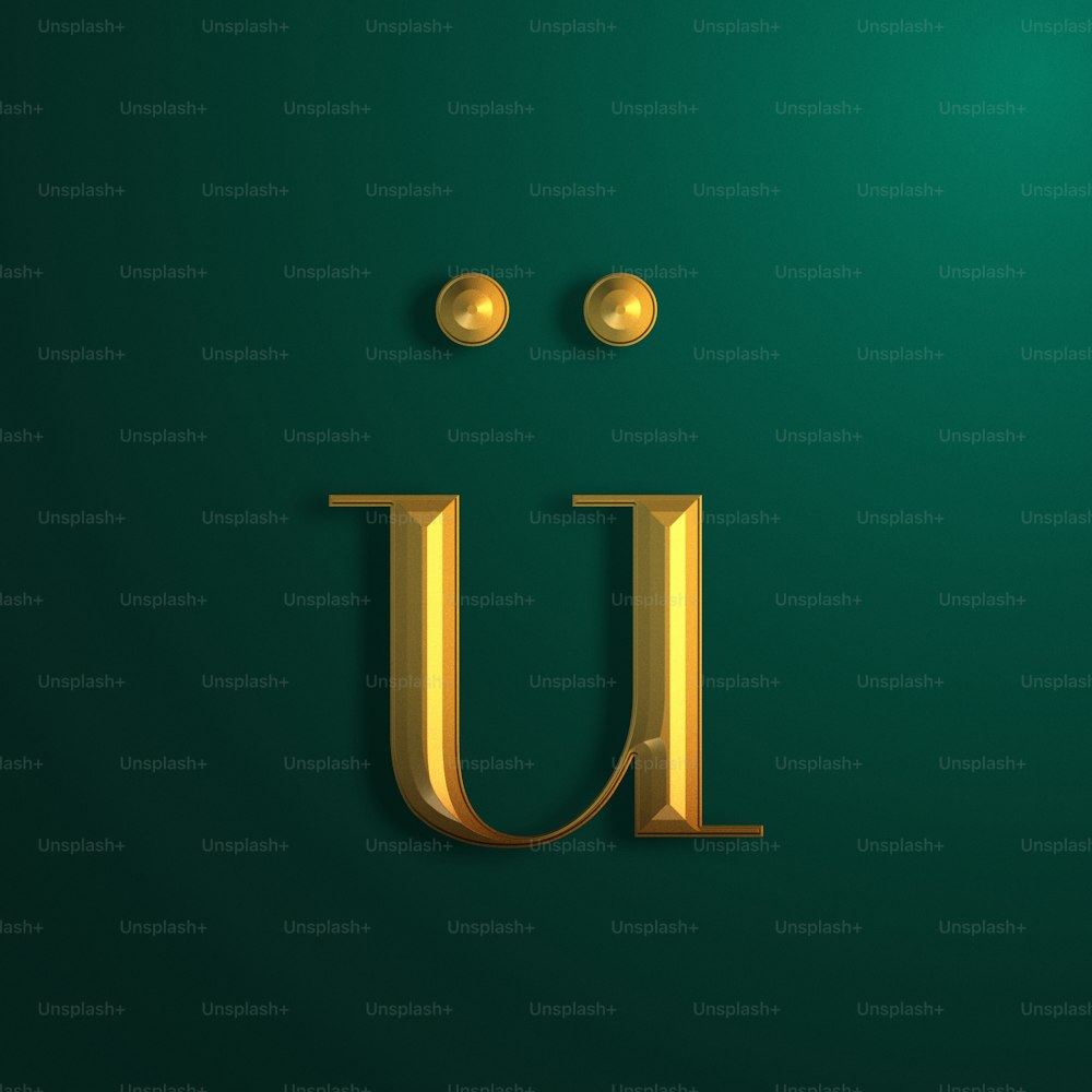 the letter u is made up of gold letters