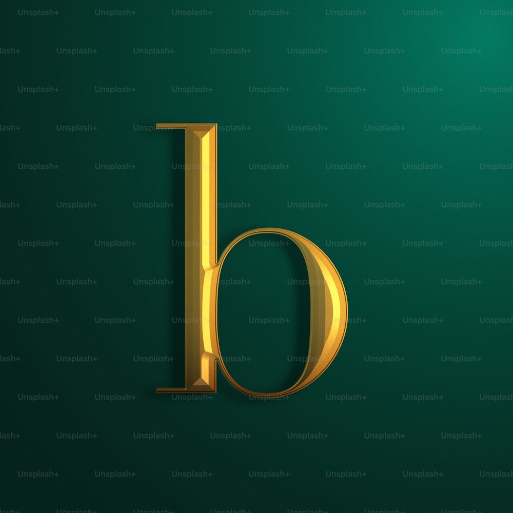 a golden letter on a green background