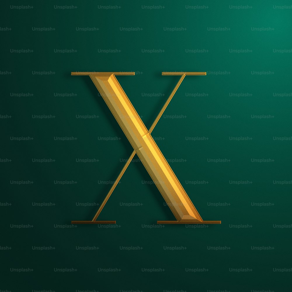a gold letter x on a green background