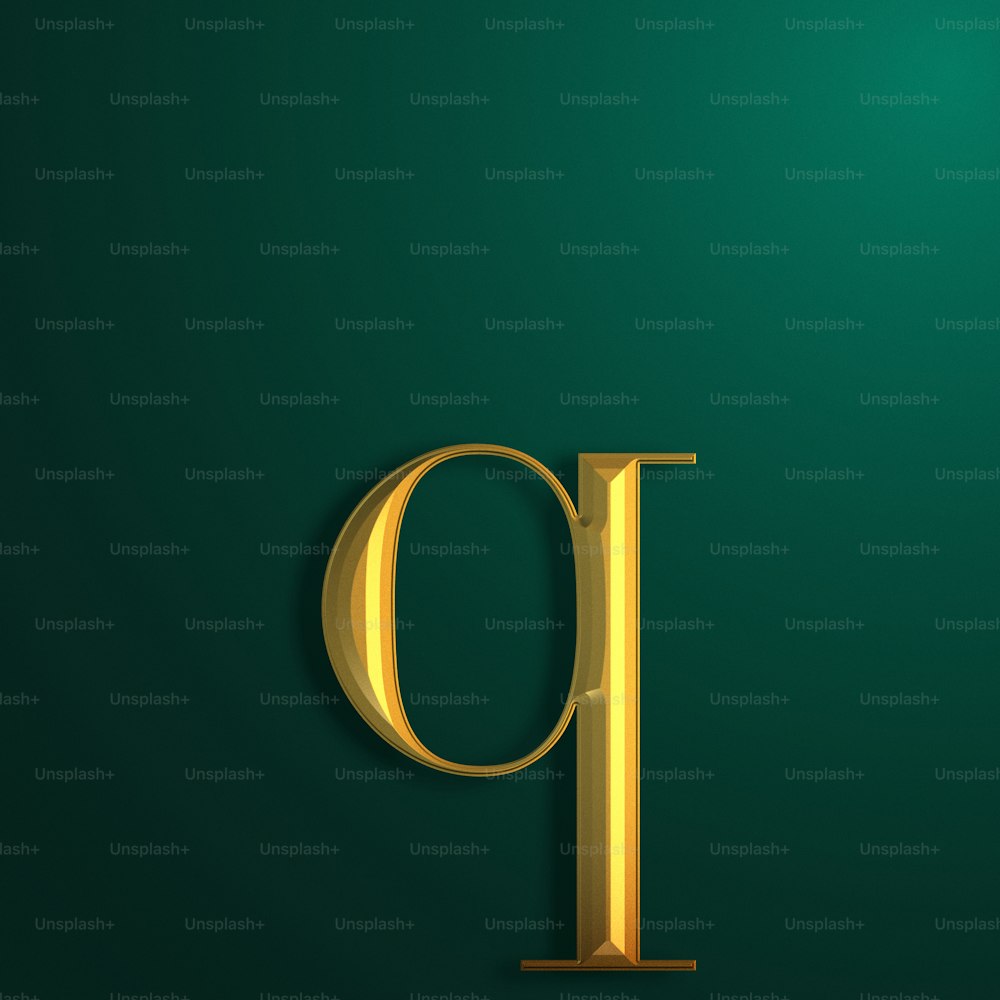 a golden letter on a green background
