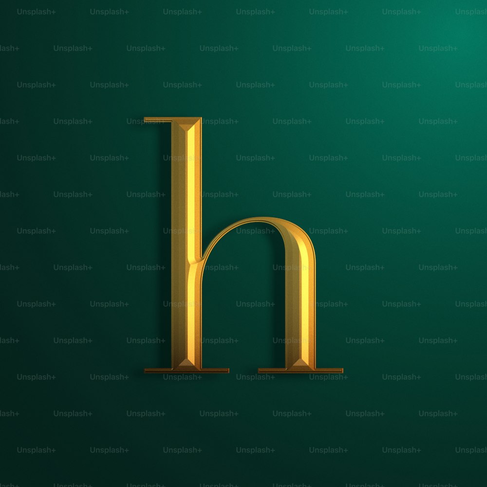 La letra H está hecha de oro