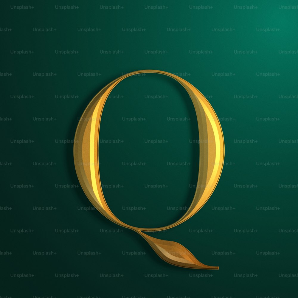 a gold letter q on a green background