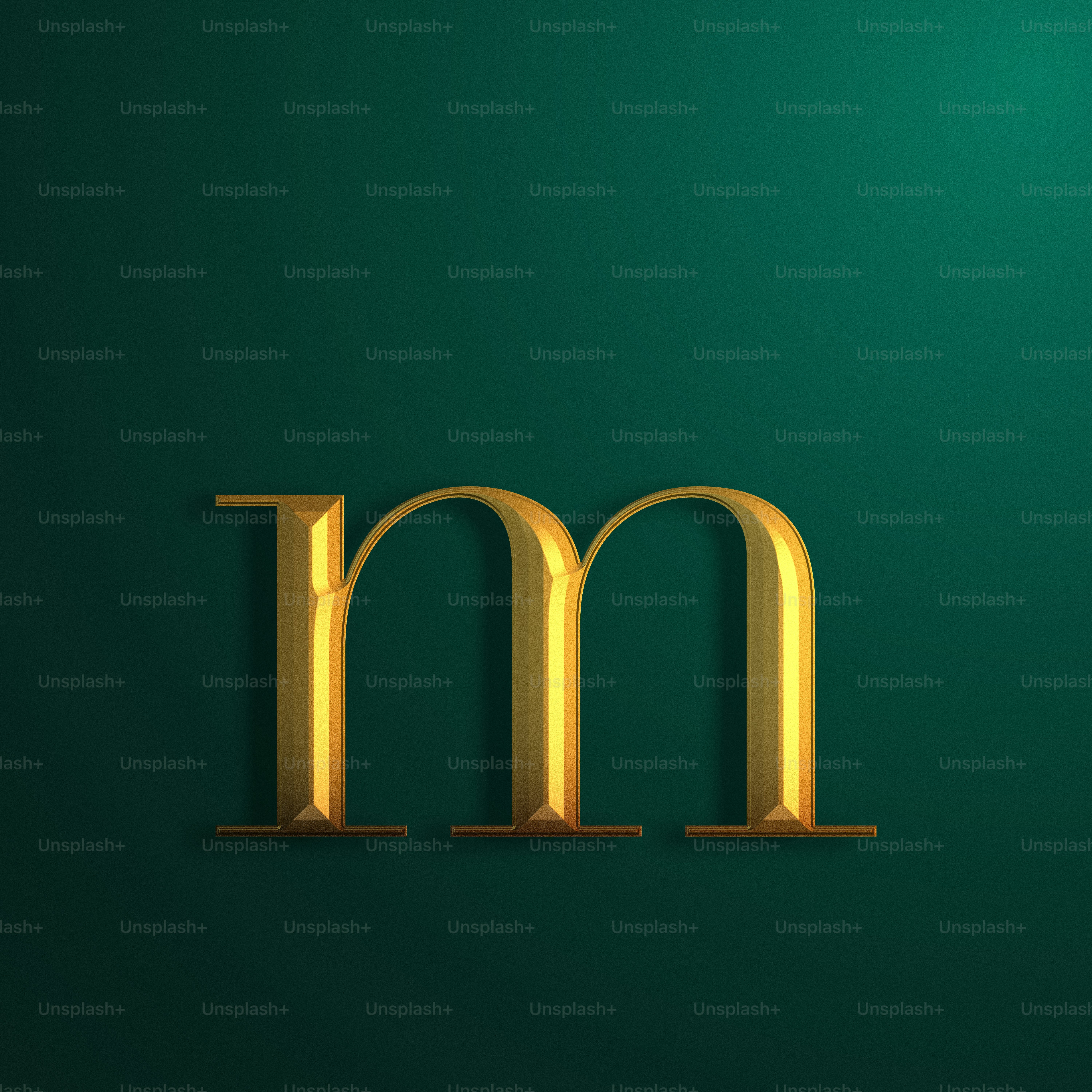 a gold letter m on a green background