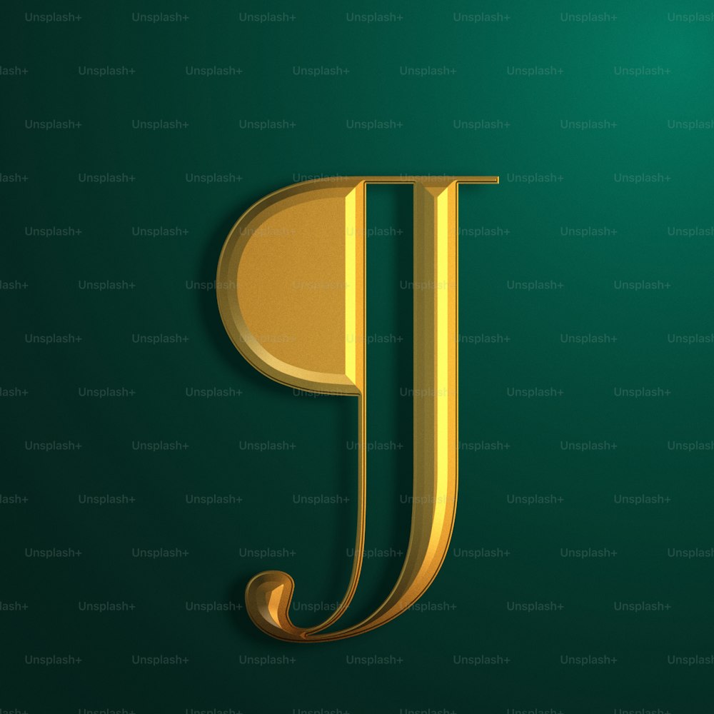 a gold letter j on a green background