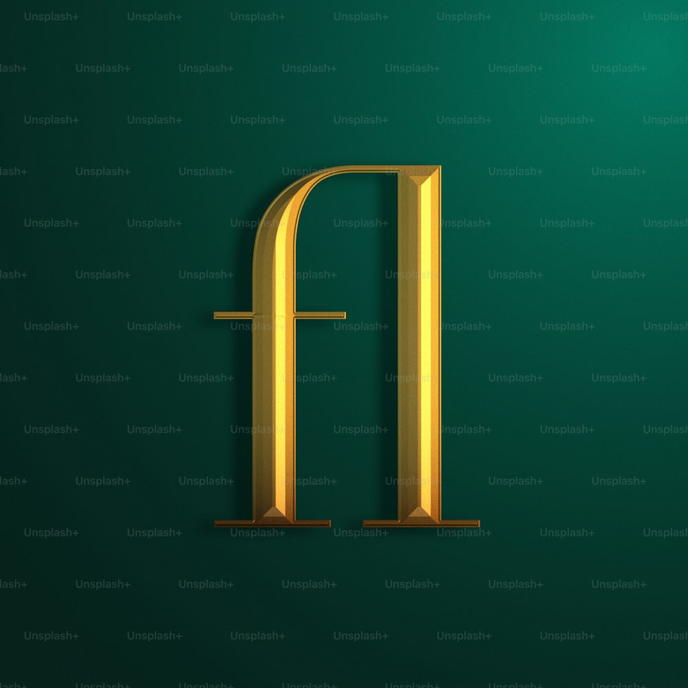 a golden letter on a green background