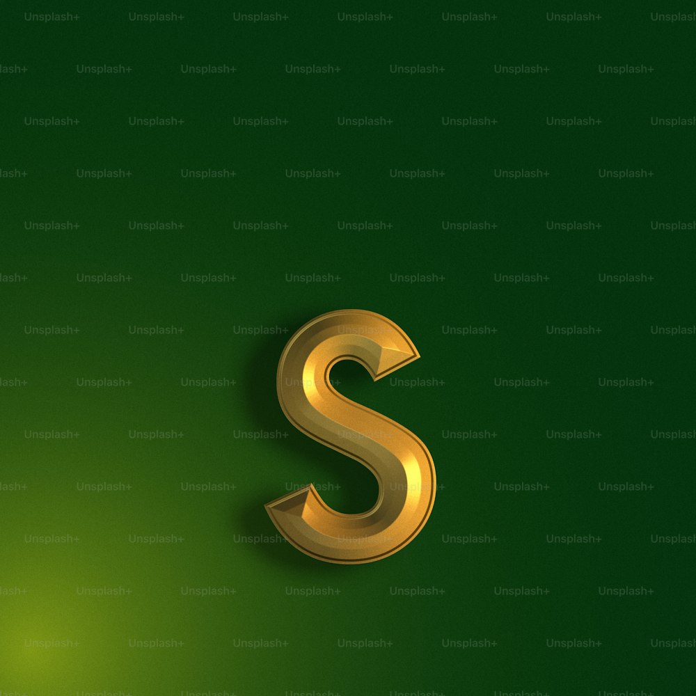 a gold letter s on a green background