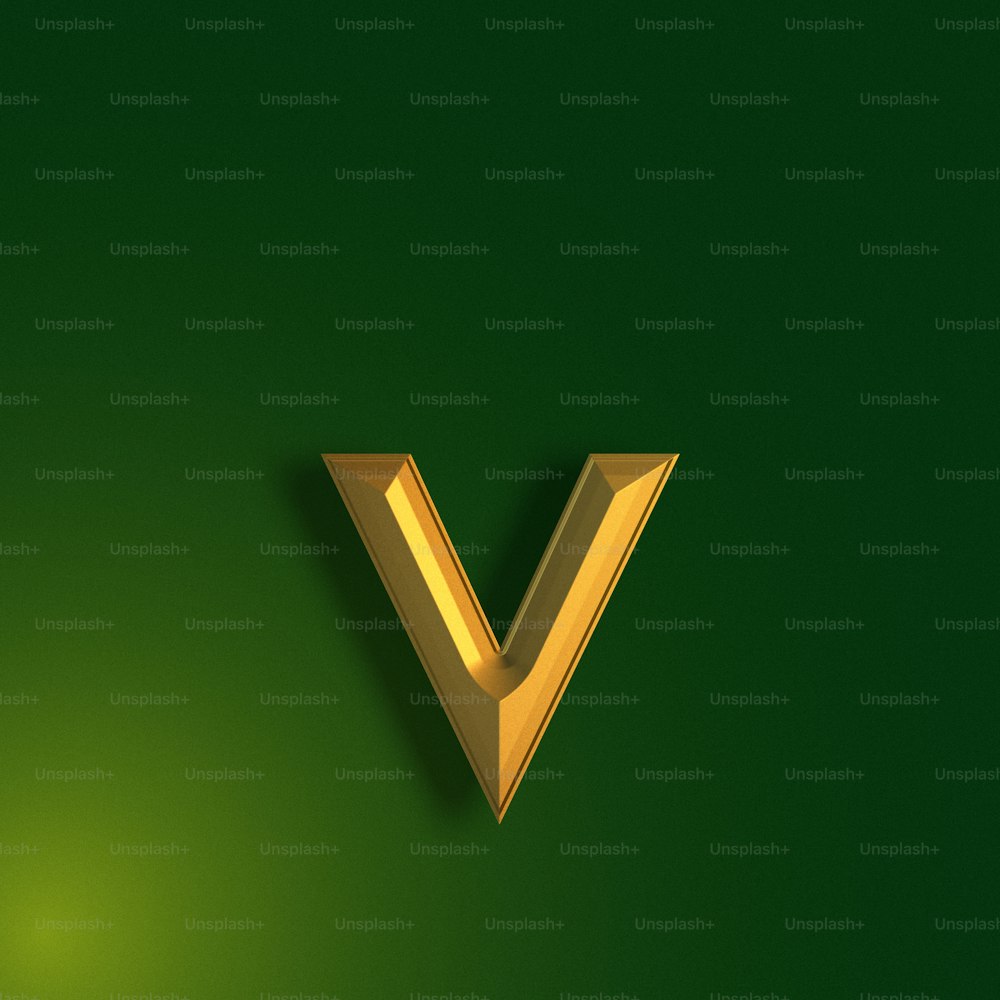 a gold v on a green background