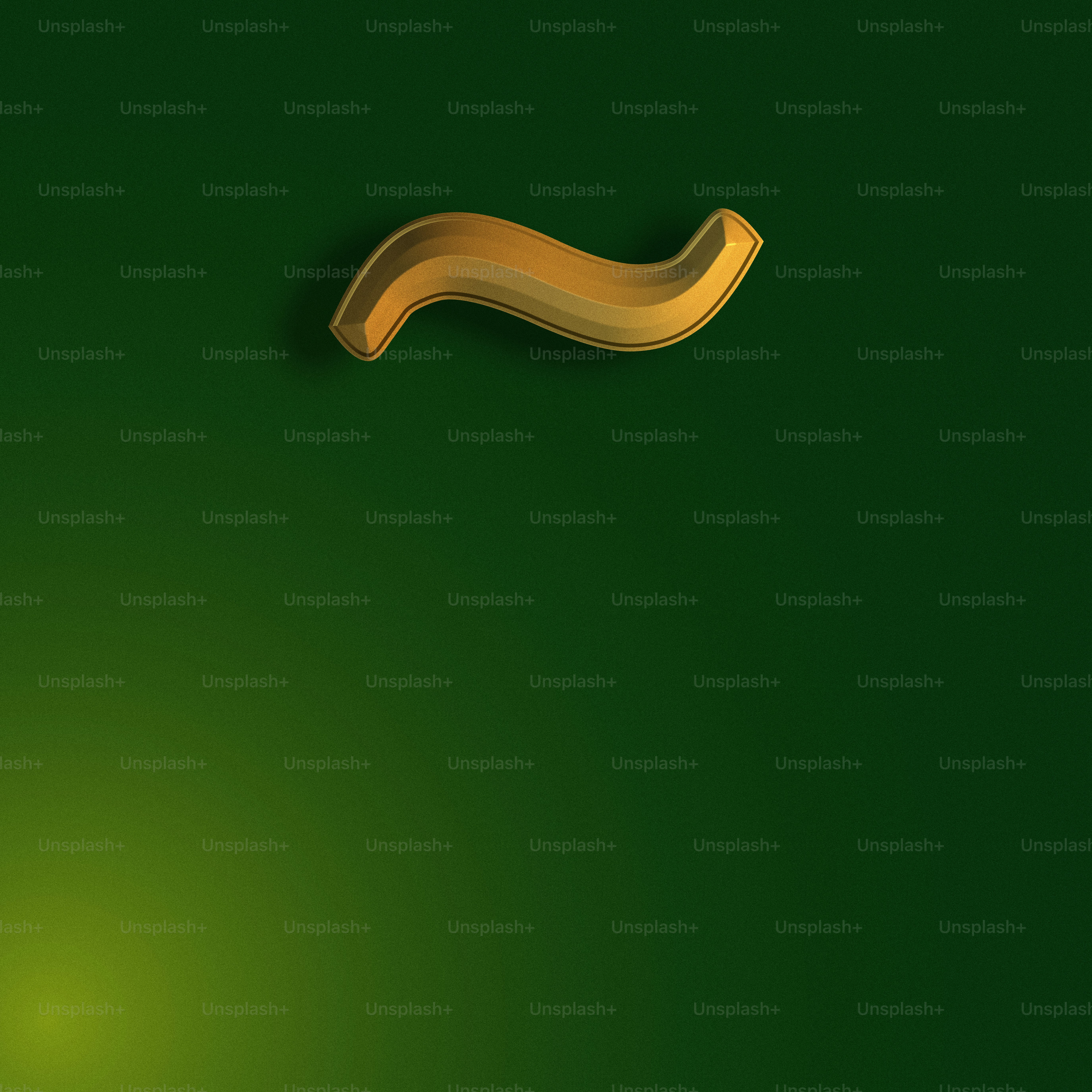 a green background with a gold curved object