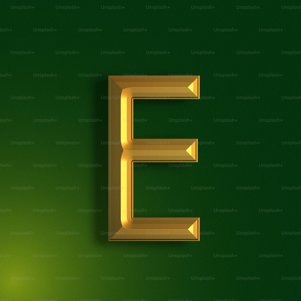 a gold letter e on a green background