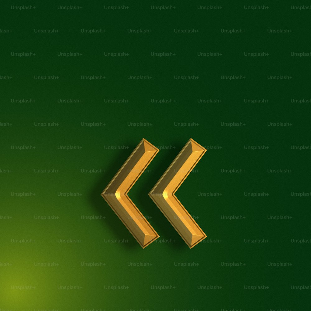 una pared verde con dos flechas doradas