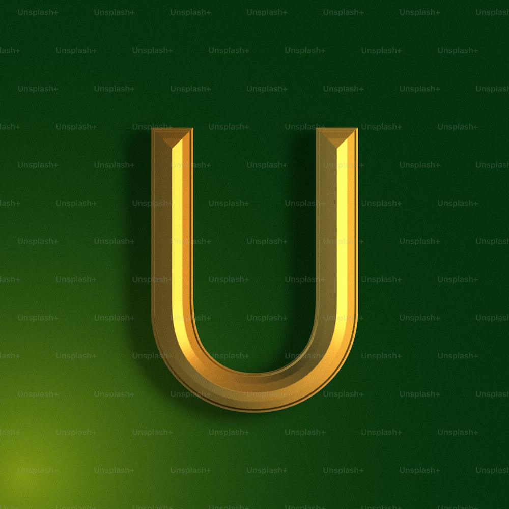 緑の背景に金色の文字U